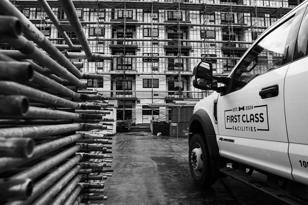 Construction site with company truck.