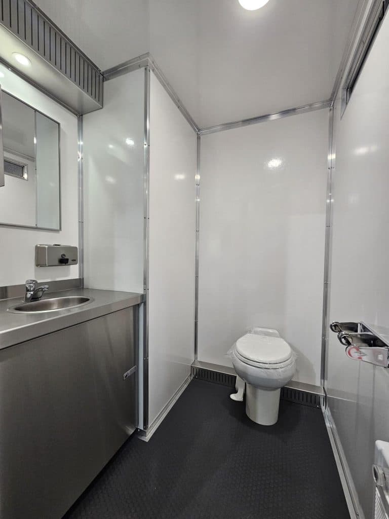 Clean, modern restroom with sink.