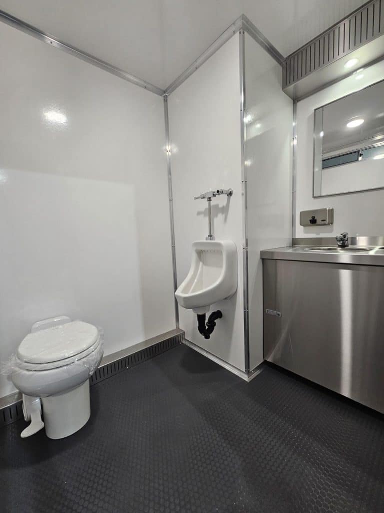 Modern restroom with toilet and urinal