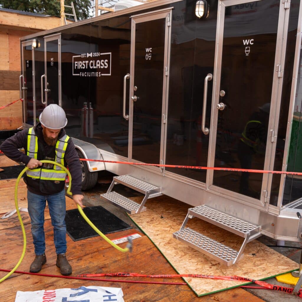 Construction site washroom requirements in BC: Heated washroom trailer with flush toilets on a Vancouver Island construction site