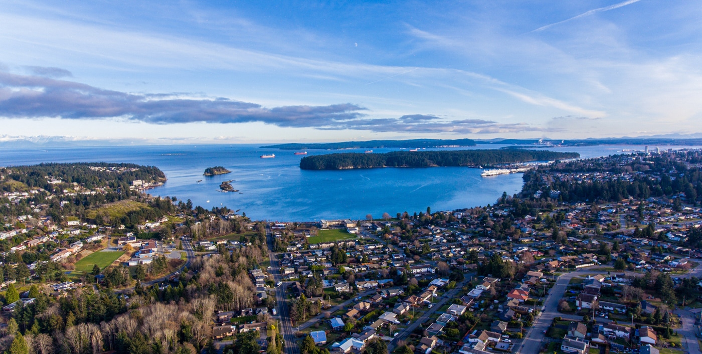 Aerial view of coastal town and water as advertisement for washroom trailer rental Nanaimo BC