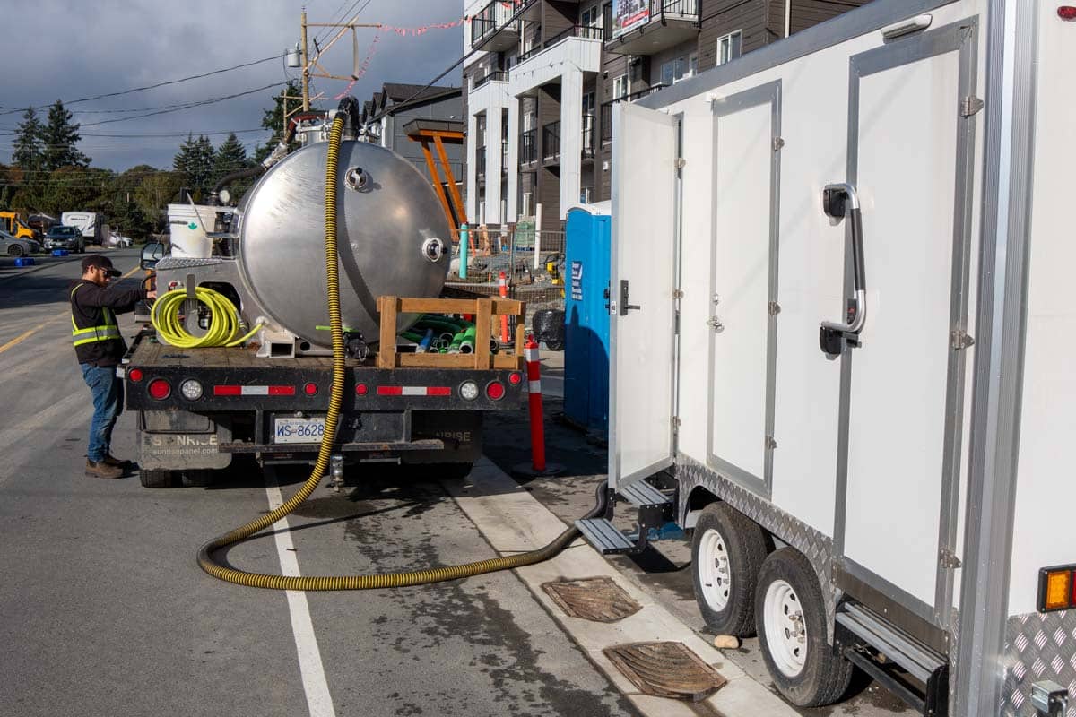 worksite washroom trailer rentals on a construction site